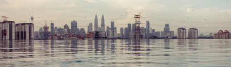 Kuala Lumpur city reflected - desaturated colour and warmth white balanceの写真素材