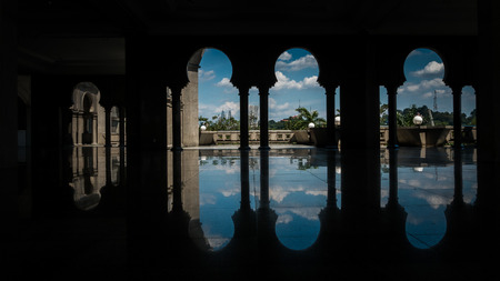Silhouette of arches framing blue skyの写真素材