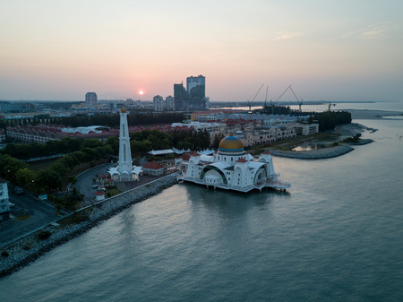 Aerial Photo - Dawn at The Melaka Straits Mosque,  located on the man-made Malacca Island near Melaka City, Melaka, Malaysia.のeditorial素材