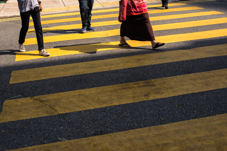 Motion Blur - People crossing the road. Blurry effect to illustrate movementの写真素材