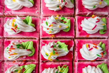 Food - Close up of colorful delicious mini pastry cake. Shallow depth of field and selective focusing.の写真素材