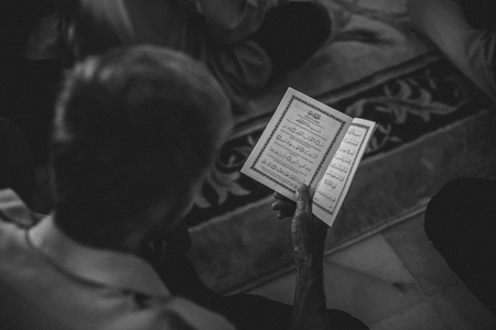 Black & White - Muslim Men reciting/reading the Quran.