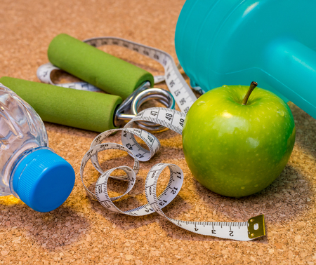 Lay Flat - Dumbbell, Fresh Apple, Measuring Tape, Mineral Water, Hand Grip - Fitness Concept
