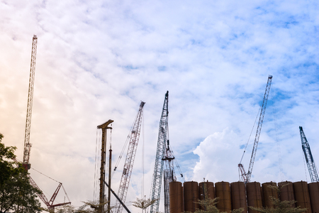 Construction Cranes, Blue Sky, Cloudsの写真素材
