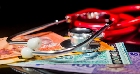 Financial Health/Insurance Concept - Ringgit Malaysia. Shallow depth of fieldの写真素材