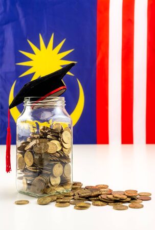 Savings for Education. Malaysia Flag in the background. Education fund concept.の写真素材