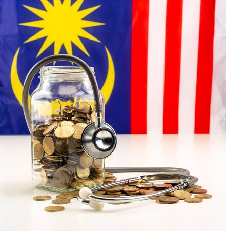 Savings for Health. Malaysia Flag in the background. Education fund concept.