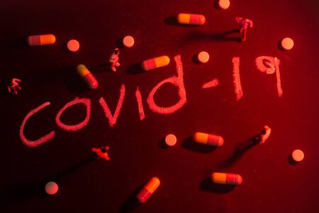 Covid-19 Coronavirus Concept  -  still object on black background with creative lighting. shallow depth of fieldの写真素材