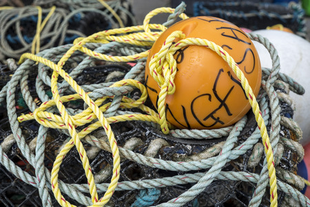 Fishing float with mooring rope