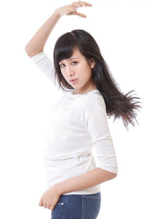 Asian female posing on white backgroundの写真素材