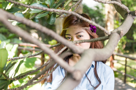 Pinoy woman in a green garden on farmの写真素材