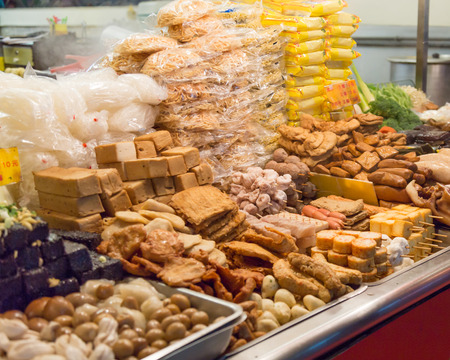 Street food at a vendor at a night market in Taipeiの写真素材