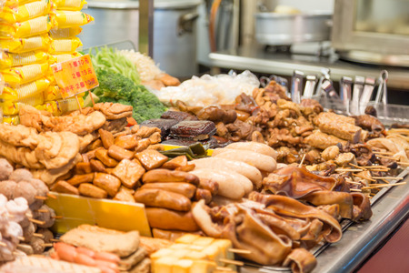 Street food at a vendor at a night market in Taipeiの写真素材