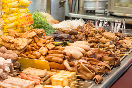 Street food at a vendor at a night market in Taipeiの写真素材
