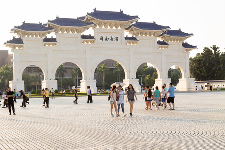 TAIPEI CITY, TAIWAN - AUGUST 2, 2015: People walking around Liberty Square in Taipei City with the Dazhong Zhizheng gates in the backgroundのeditorial素材