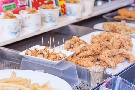 NEW TAIPEI CITY, TAIWAN - SEPTEMBER 11, 2015: Street food at Danshui shopping areaのeditorial素材