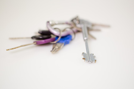 Bunch of keys isolated on white with shallow DOF