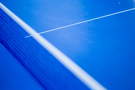 Net on blue   tennis tableの写真素材