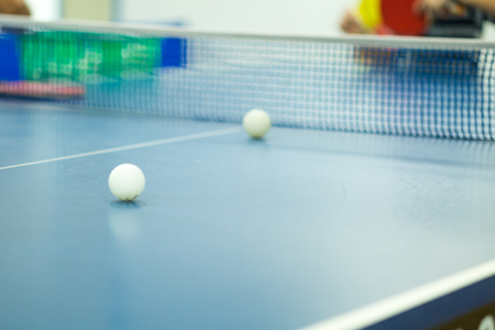 Blue   tennis table with ballの写真素材