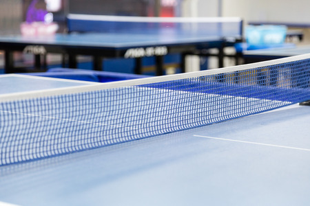 Blue ping pong tennis table with ballの写真素材