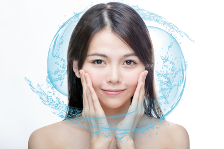 Chinese woman with blue water splash. skincare conceptの写真素材