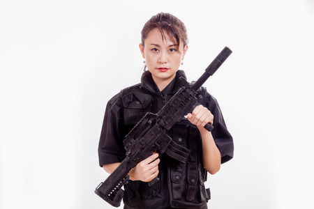 Chinese female police officer with semi-automatic rifleの写真素材