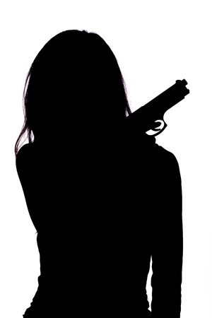 Silhouette of woman with pistol on white backgroundの写真素材