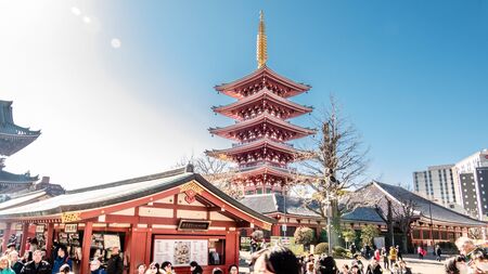 TOKYO, JAPAN - FEBRUARY 1, 2019: Tourists visit Gojunoto five story pagoda at Senso-ji templeのeditorial素材