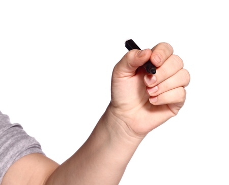 Human arm of presenter with black marker ready to writeの写真素材