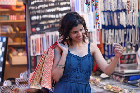 Young woman shopping in the bazaar in Tel Aviv, Israel.の写真素材