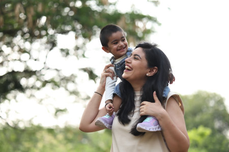 Happy mother and son in the park. Concept of happy family.の写真素材