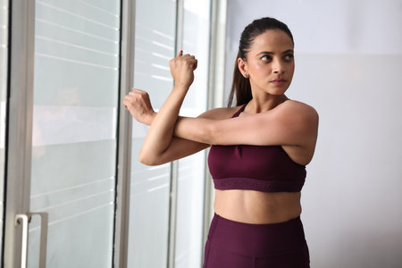 Portrait Of A Young Physically Fit Woman Showing Her Well Trained Body