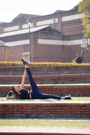 Young woman practicing yoga. Concept of healthy lifestyle and relaxation.の写真素材
