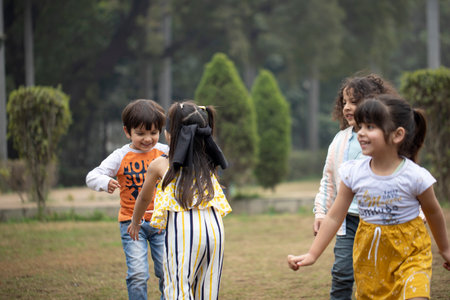 Group of asian children playing and having fun in the park.の写真素材