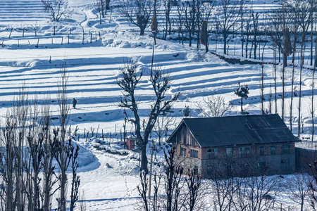 Snow-filled farm villages and rivers on the way from Srinagar to Sonmarg and Gulmargの写真素材