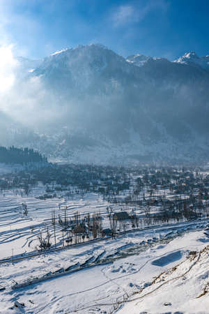 Snow-filled farm villages and rivers on the way from Srinagar to Sonmarg and Gulmargの写真素材
