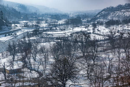 Snow-filled farm villages and rivers on the way from Srinagar to Sonmarg and Gulmarg