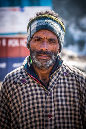 Sonmarg, Kashmir, India - February 03, 2021 : Portrait of local kashmiri man horseman in sonmargのeditorial素材