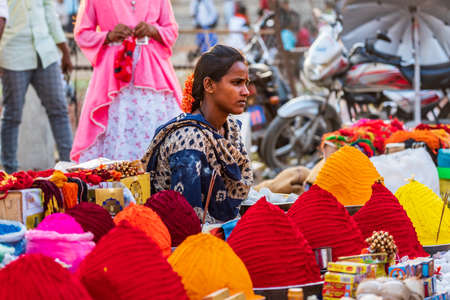 HAMPI, KARNATAKA, INDIA - JANUARY 12, 2020: Local market shops in front of old Hampi Bazaar. Hampi, Karnataka, India.のeditorial素材