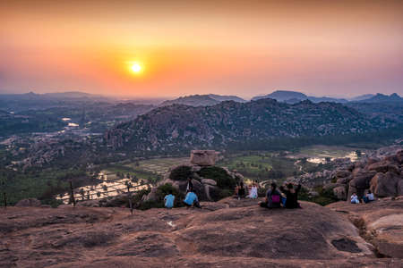 Hampi, Karnataka, India - January 15, 2020 : Sunset view of Kishkinda, Anjanadri Hill, (Monkey Temple) Anjaneya Parvat, the birthplace of Hanuman God, Hampi, Karnataka, India.のeditorial素材