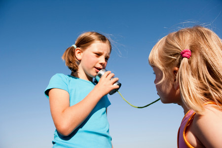 Young Girls With Tin Can Phoneの写真素材