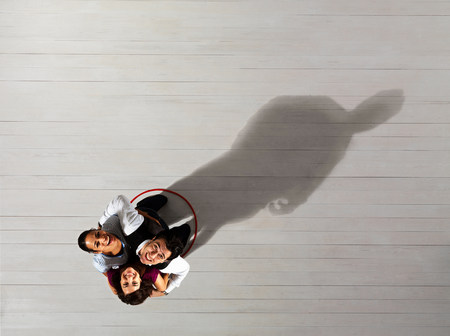 Business men and women in circlesの写真素材