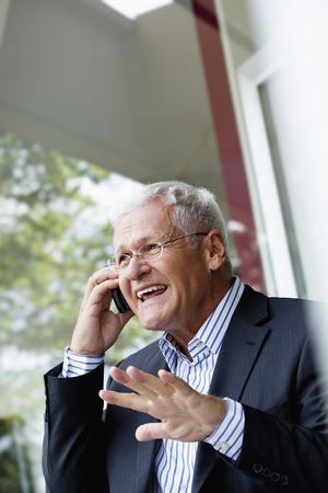 Senior Businessman Using Cellphoneの写真素材