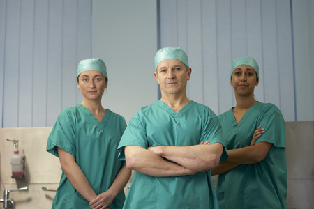 Three medical staff in scrubsの写真素材
