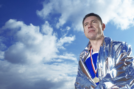 athlete in silver blanket