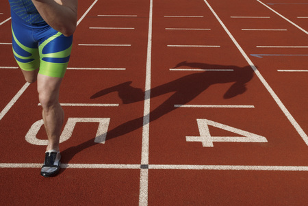 athlete and shadowの写真素材