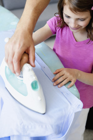 Girl ironingの写真素材