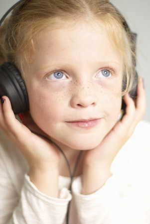 Young girl with headphones onの写真素材