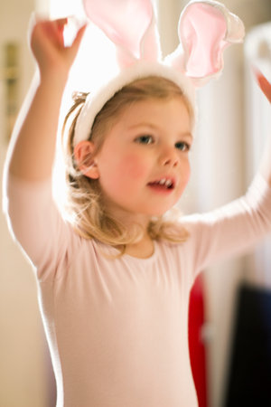 Girl wearing bunny earsの写真素材