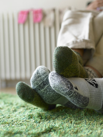 Close up of couple?s feet in socks